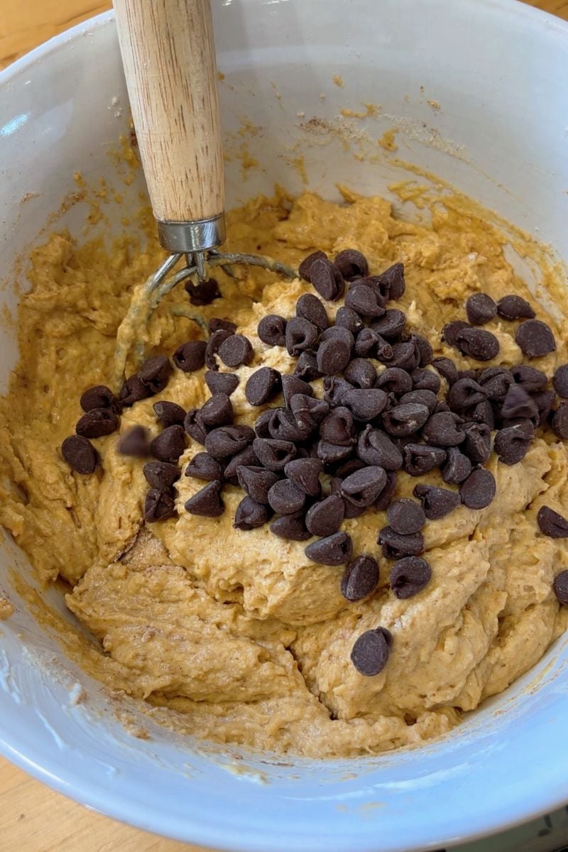 Sourdough Protein Pumpkin Spice Muffin batter with chocolate chips on the top.