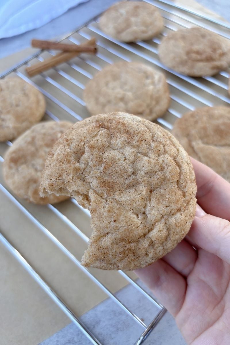 Easy Sourdough Snickerdoodle with a bite taken out of it