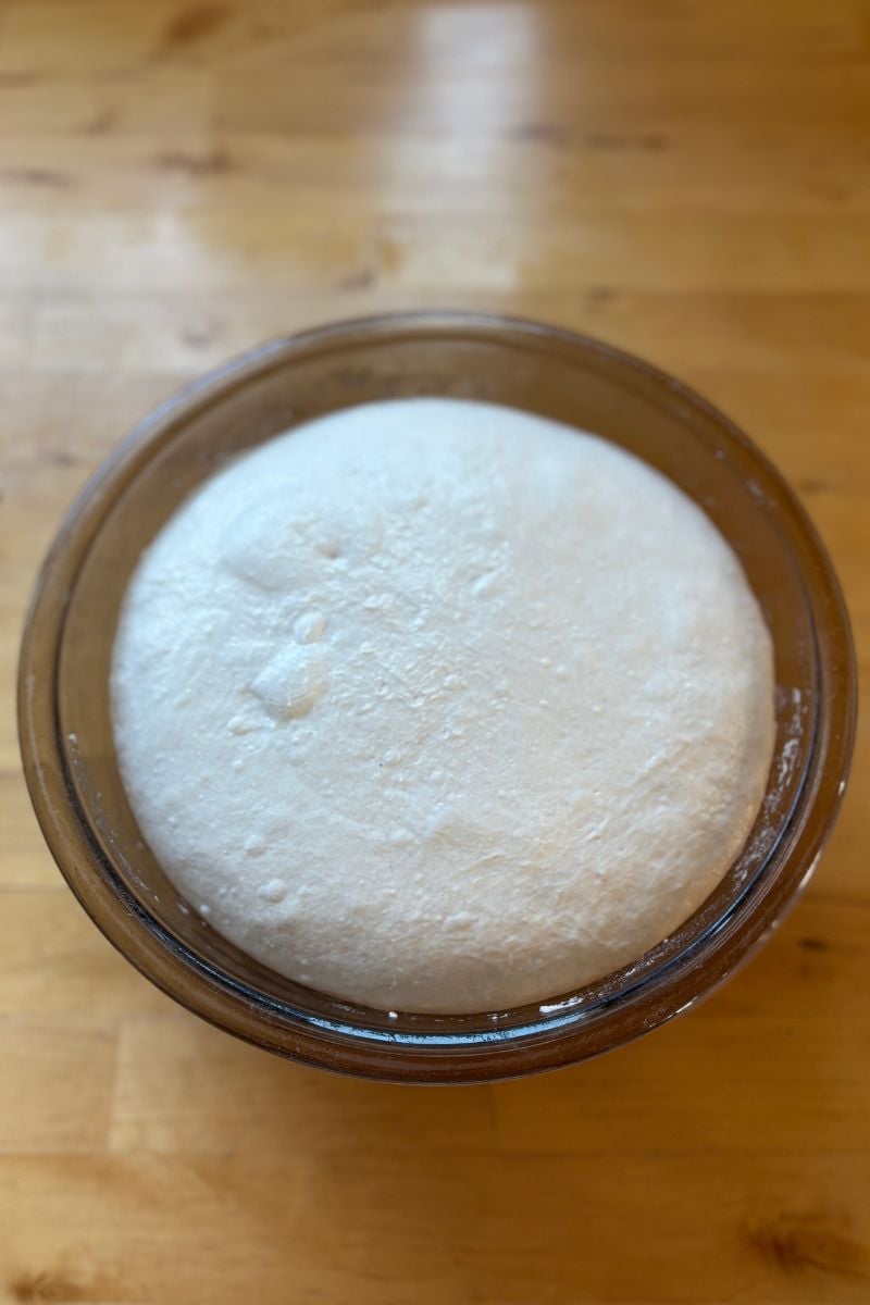 Sourdough dough in a bowl after bulk fermentation