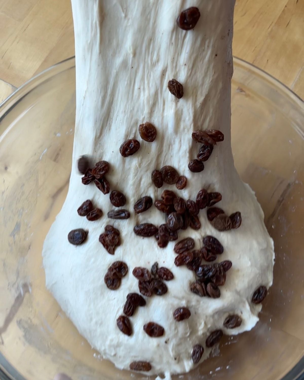 Stretch and fold process of Soft Sourdough Cinnamon Raisin Swirl Bread
